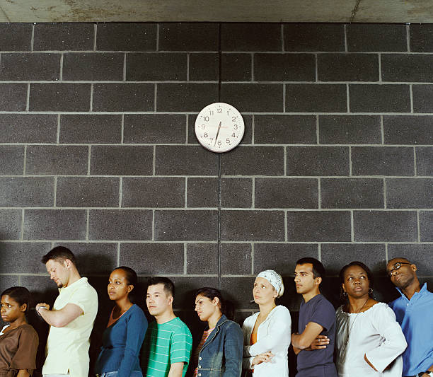 people impatiently waiting in line.